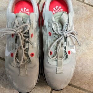 Nike Gray and Red Athletic Shoes with Modern Design